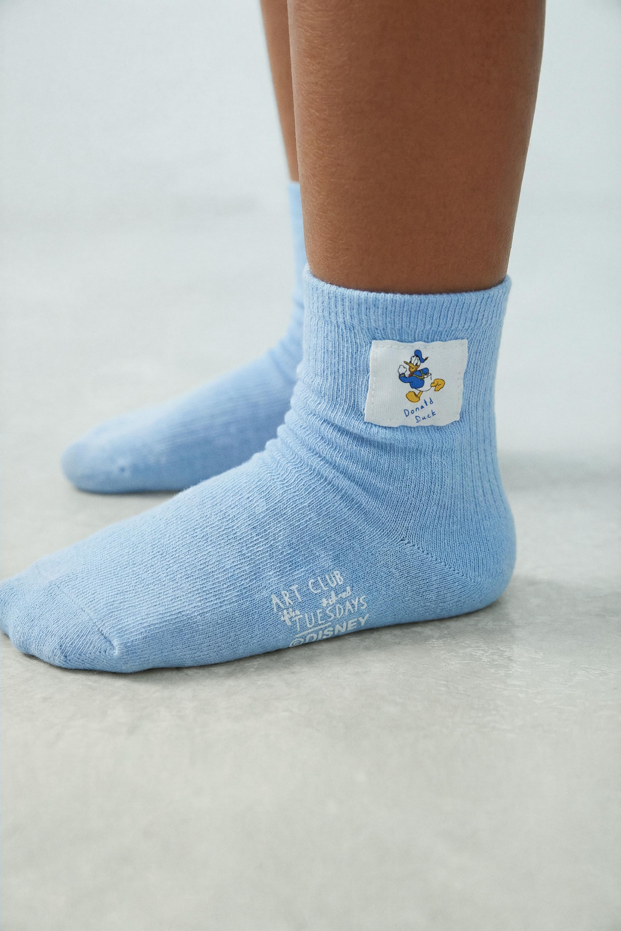 TWO-PACK OF MICKEY MOUSE AND DONALD DUCK LONG SOCKS © DISNEY